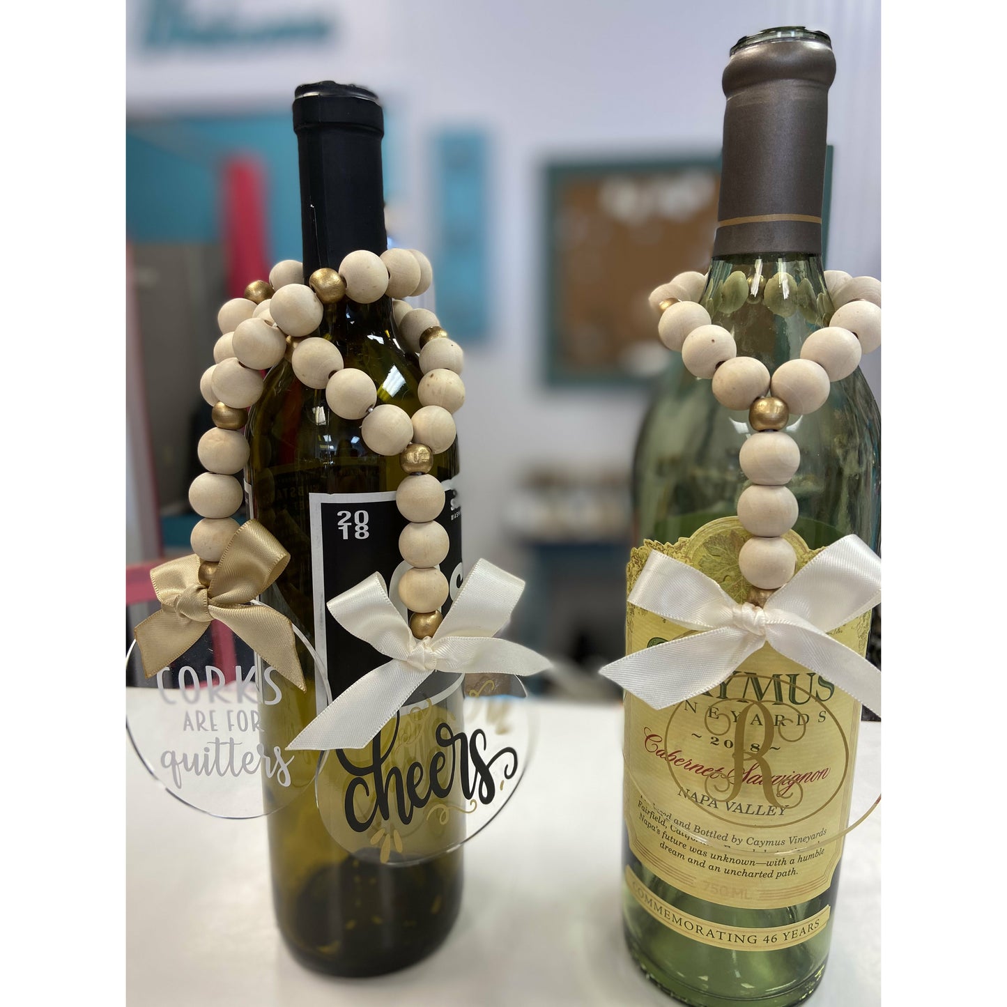 Bottle Necklaces by Joseph Grace