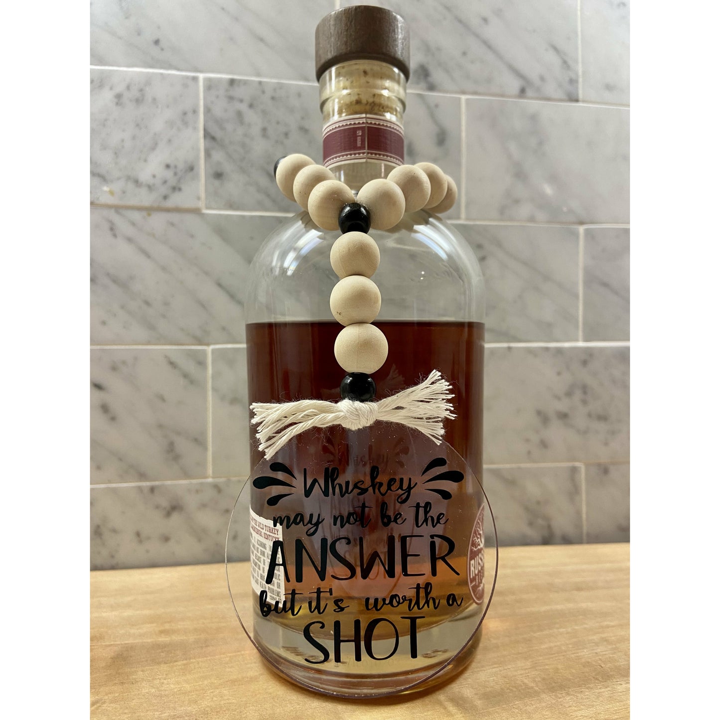 Bottle Necklaces by Joseph Grace