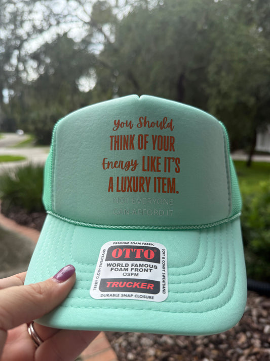 Energy is Luxury Trucker Hat
